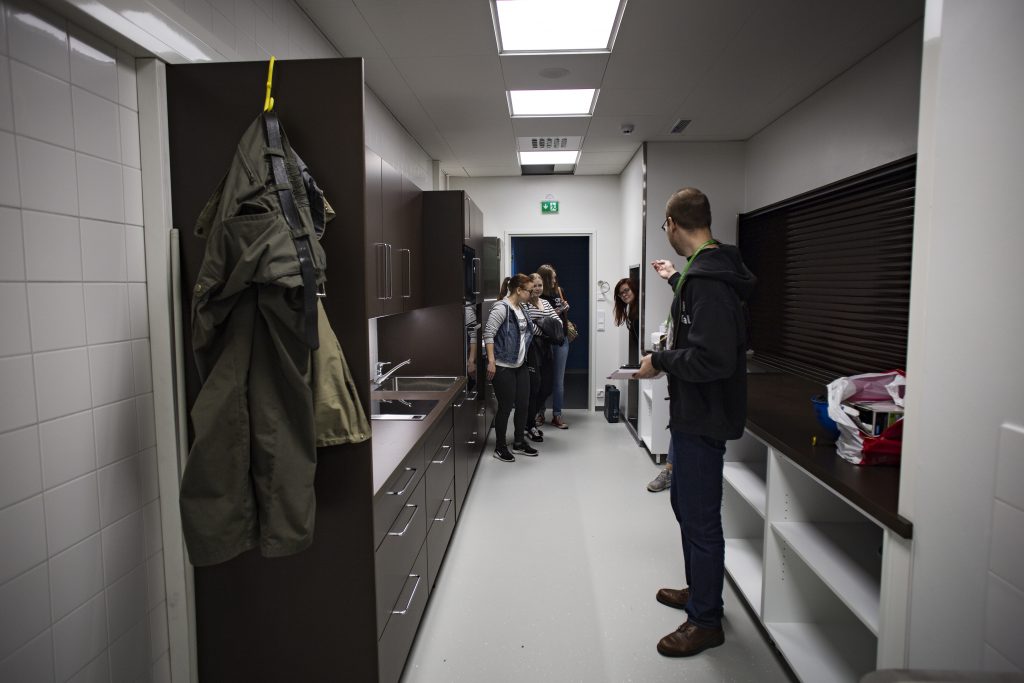 The representatives of humanist subject societies visited new premises on the 11th of June. Pictured: the Chair of the Board of the Student Union Kalle Parviainen, Outi Niemi, Heli Paaso-Rantala, Miriam Putula and Emilia Käsmä visiting the Humus cafe's new kitchen.